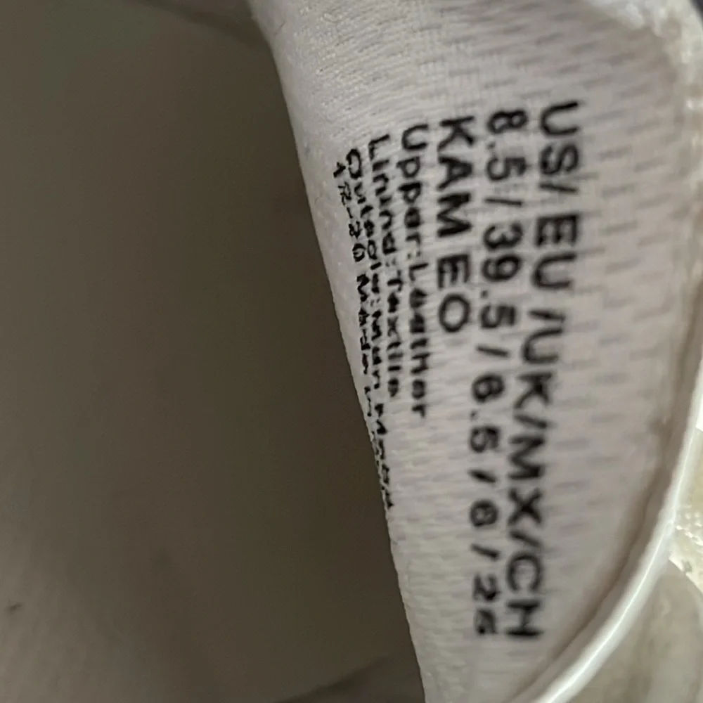 Kenneth Cole white leather lace up sneakers with animal print bottoms. - Picture 6 of 7